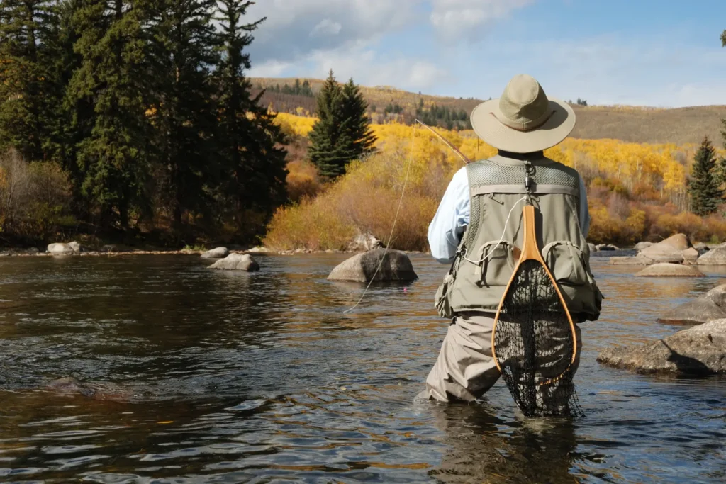Person fly fishing in a Colorado river