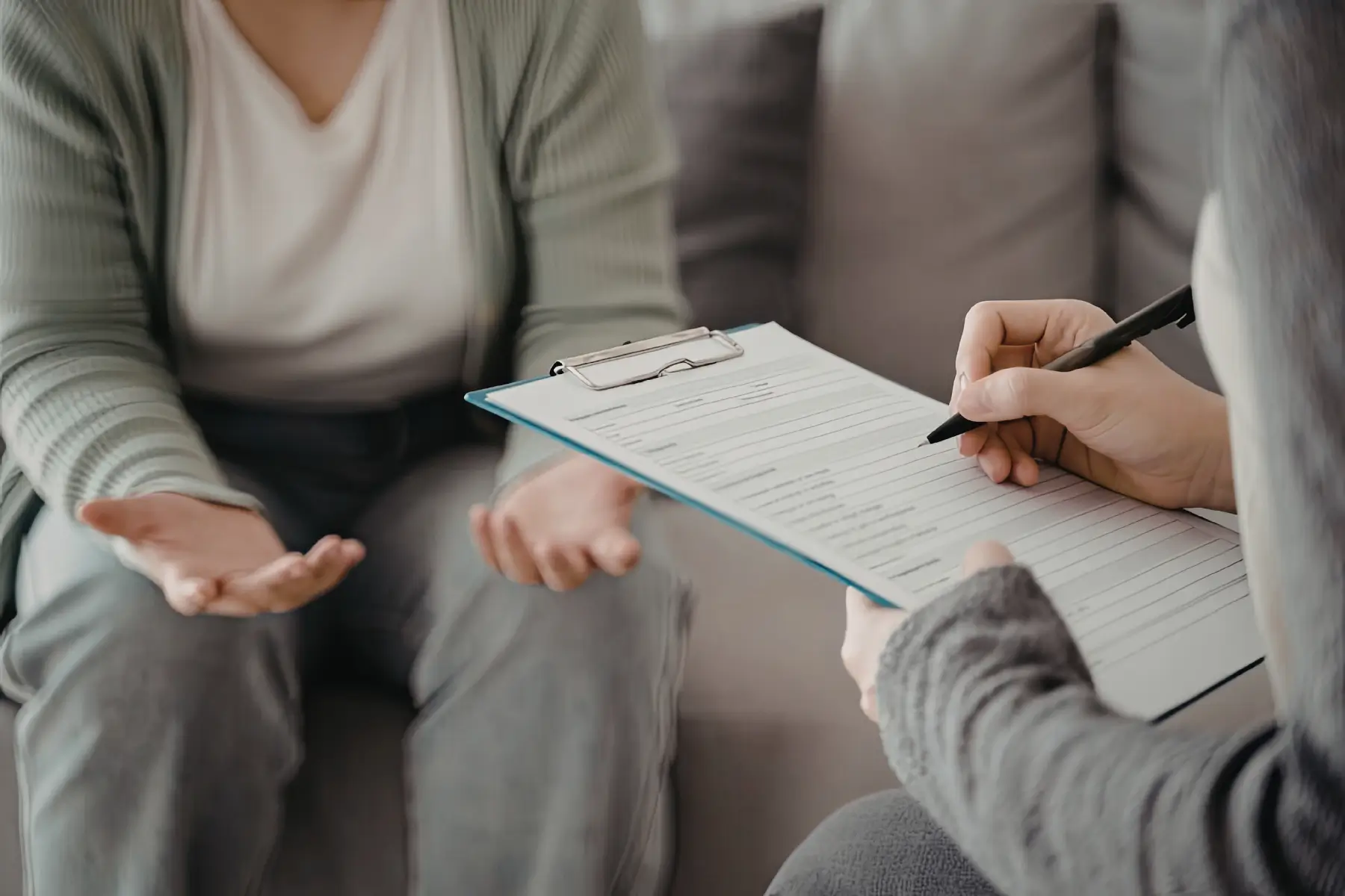 psychiatrist taking an intake assessment with a patient